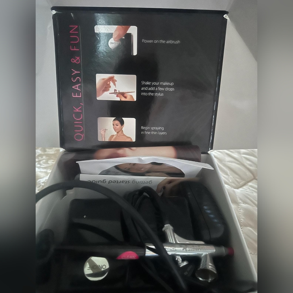 Luminous Makeup Air Spray Machine .Used once for photo shoot. Like new in Box